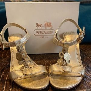 Coach “Lucile” textures gold metallic charm heels